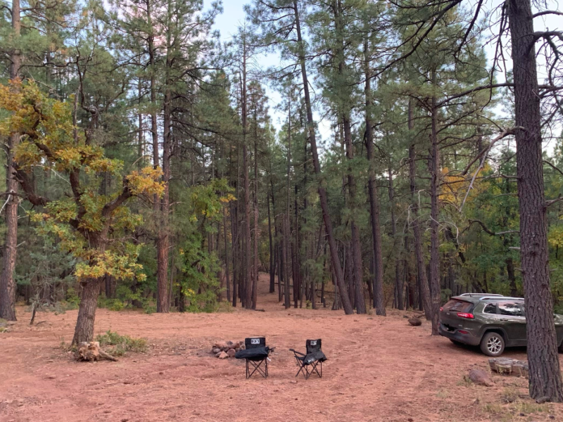 Schnebly Hill Road, parked car, two chairs nearby